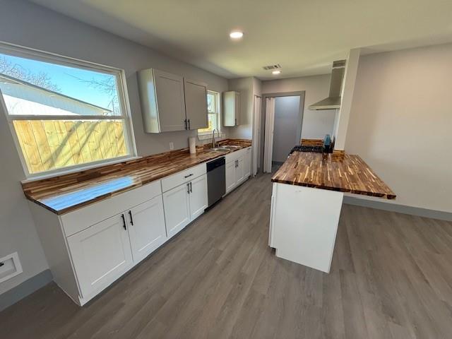 5845 Haney Drive Watauga, TX 76148 - Photo 9 of 37 a kitchen with a sink and cabinets