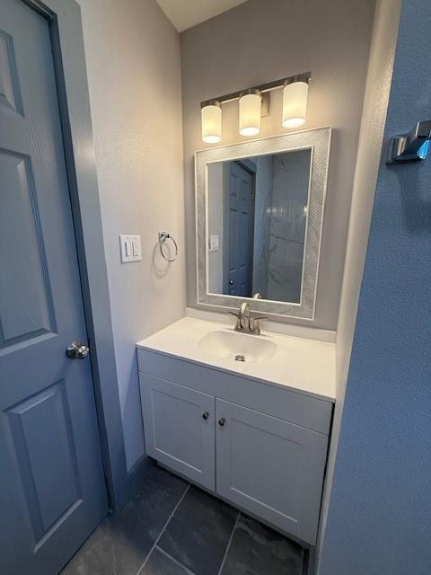 5845 Haney Drive Watauga, TX 76148 - Photo 20 of 37 a bathroom with a double vanity sink and mirror