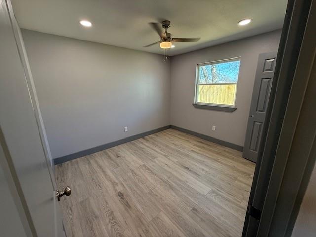 5845 Haney Drive Watauga, TX 76148 - Photo 21 of 37 an empty room with a window and a fan