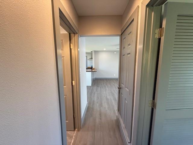 5845 Haney Drive Watauga, TX 76148 - Photo 25 of 37 a view of a hallway with wooden floor