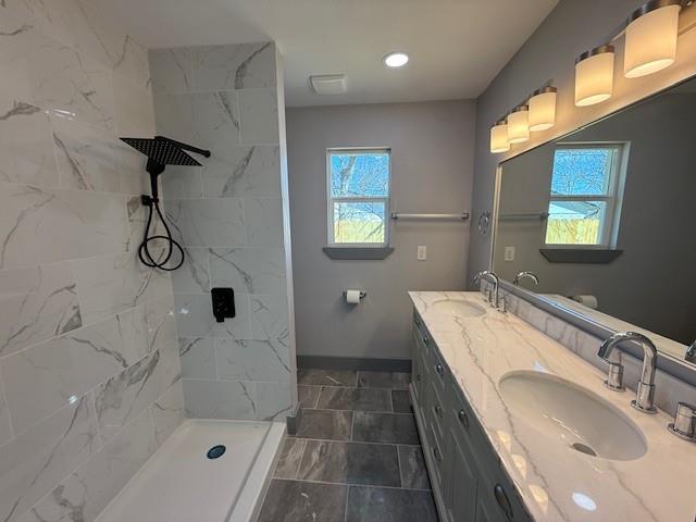 5845 Haney Drive Watauga, TX 76148 - Photo 26 of 37 a bathroom with a tub sink and mirror