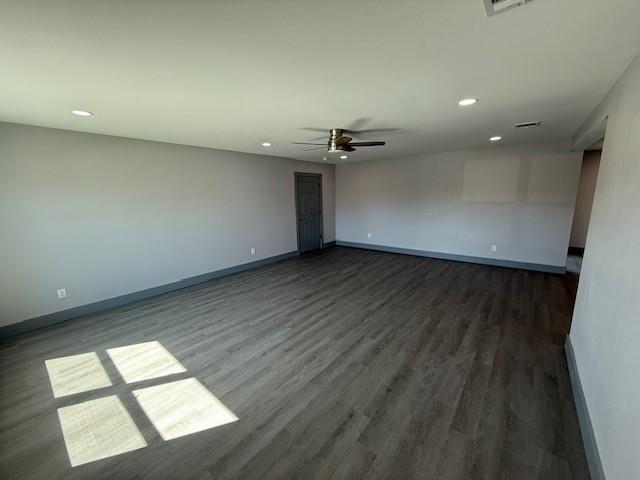 5845 Haney Drive Watauga, TX 76148 - Photo 5 of 37 an empty room with wooden floor and windows