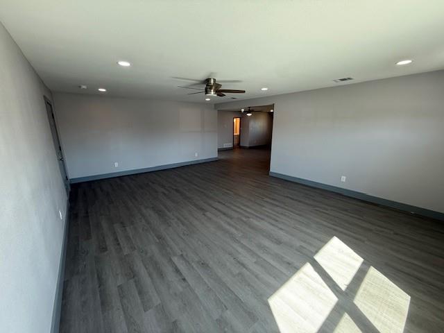 5845 Haney Drive Watauga, TX 76148 - Photo 6 of 37 an empty room with wooden floor and windows
