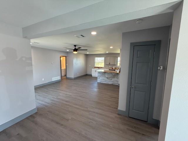 5845 Haney Drive Watauga, TX 76148 - Photo 8 of 37 a view of a big room with wooden floor and a kitchen