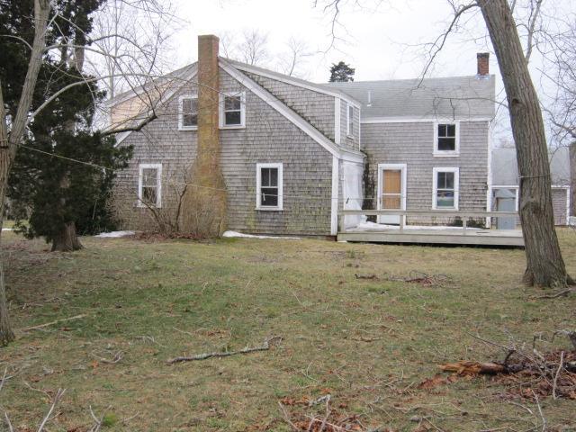 630 Samoset Road Eastham, MA 02642 - Photo 5 of 29 a front view of a house with a yard
