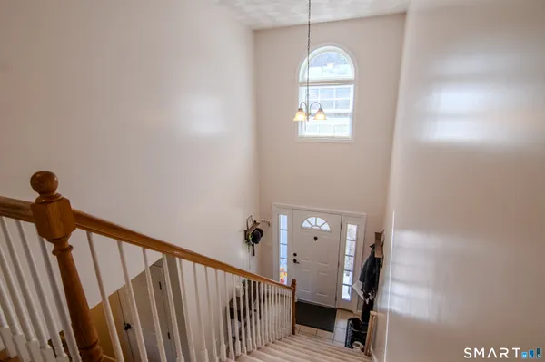 a view of a livingroom with a staircase