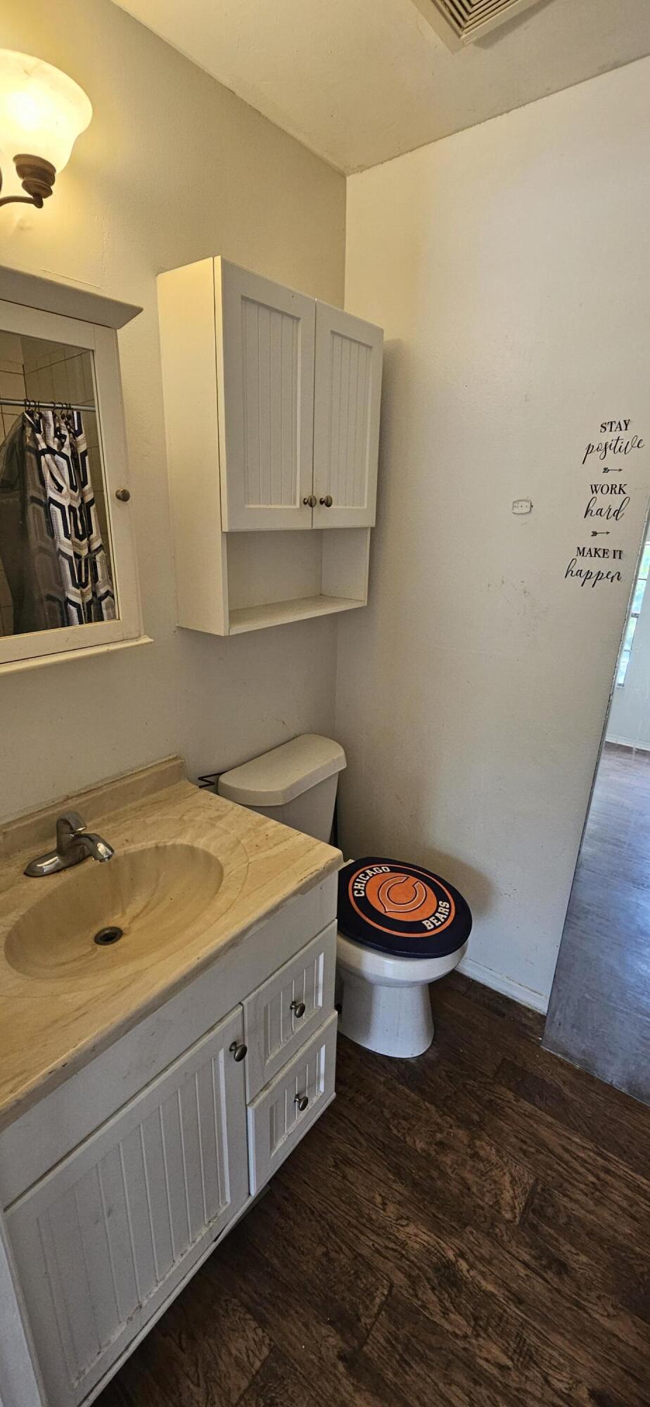 340 San Marino Road Southwest Palm Bay, FL 32908 - Photo 6 of 16 a bathroom with a sink and a toilet