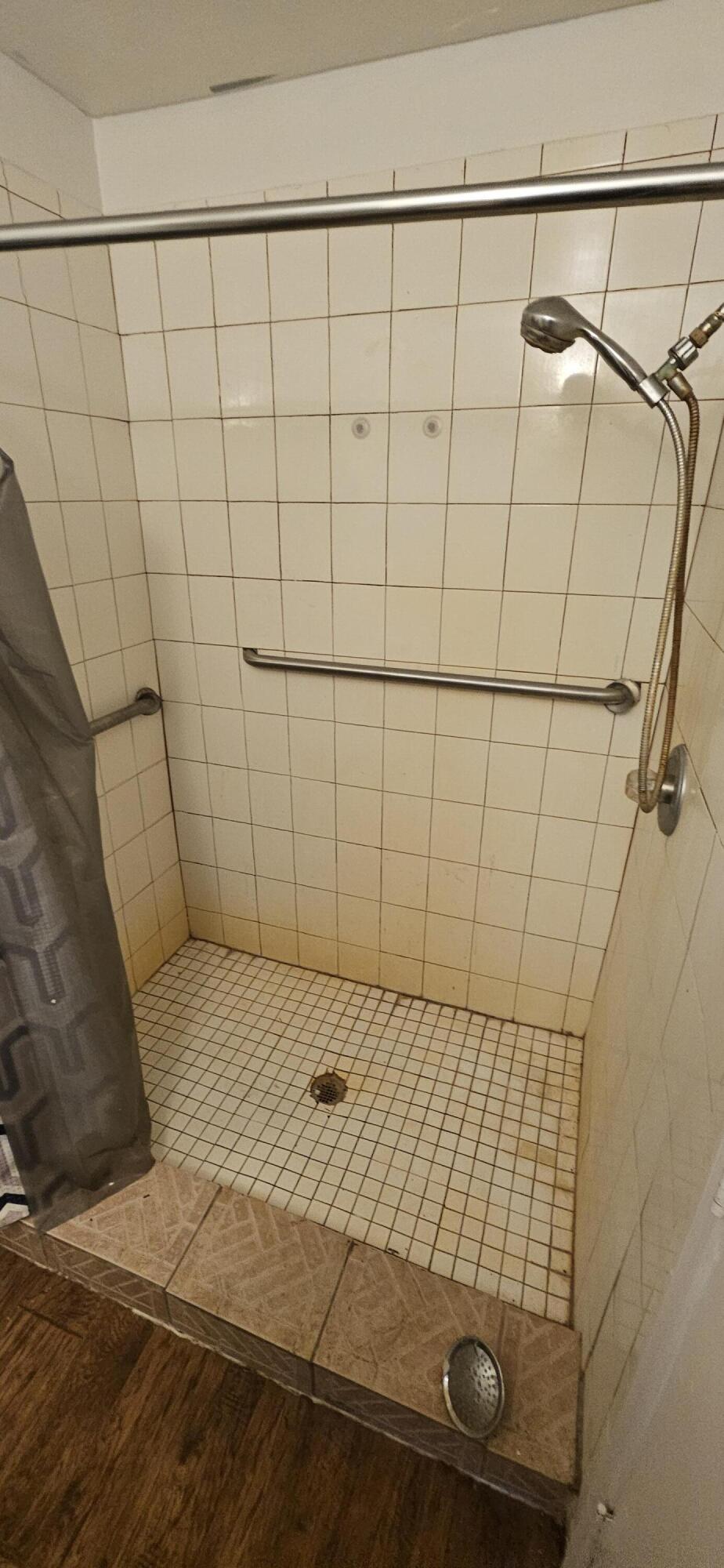 340 San Marino Road Southwest Palm Bay, FL 32908 - Photo 7 of 16 a bathroom with a shower