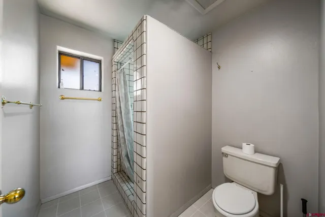 a view of a porch with wooden floor