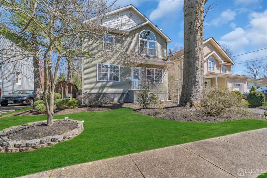 40 Kimberly Road Colonia, NJ 07067 - Photo 1 of 30 a front view of a house with a yard
