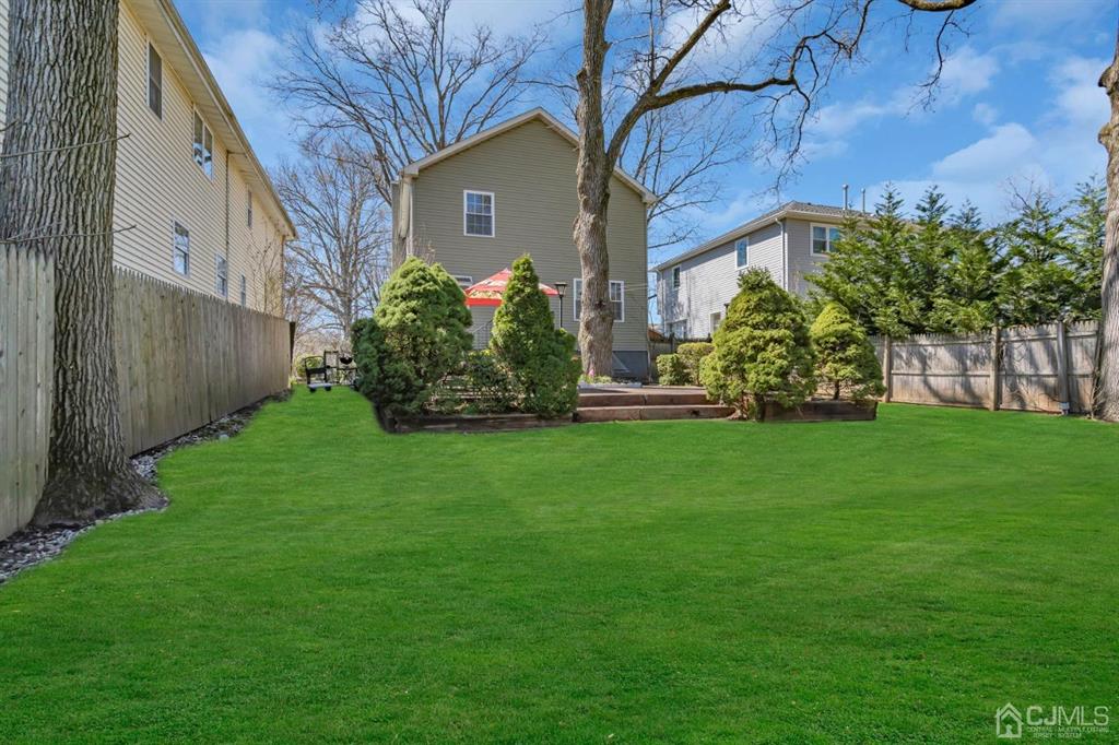 40 Kimberly Road Colonia, NJ 07067 - Photo 12 of 30 a front view of a house with garden