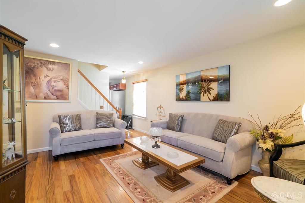 40 Kimberly Road Colonia, NJ 07067 - Photo 14 of 30 a living room with furniture and a rug