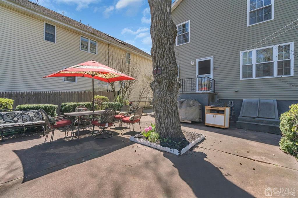 40 Kimberly Road Colonia, NJ 07067 - Photo 5 of 30 a view of a backyard with sitting area and furniture