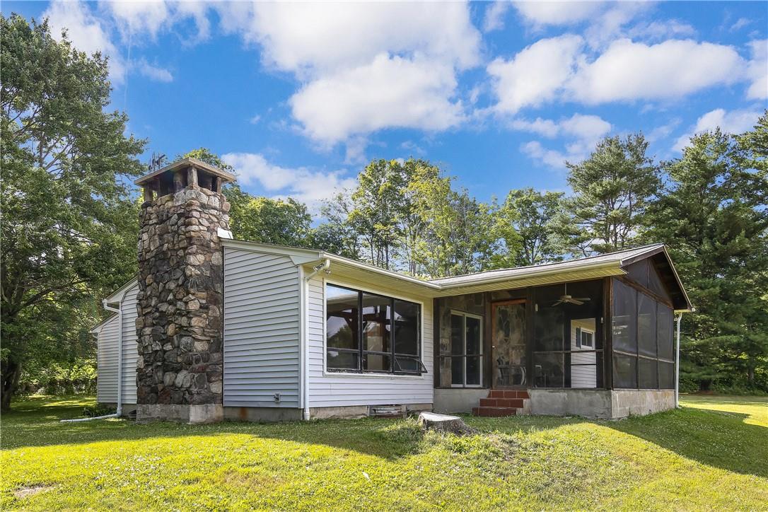 379 Mooney Hill Road Patterson, NY 12563 - Photo 1 of 1 a front view of a house with a yard