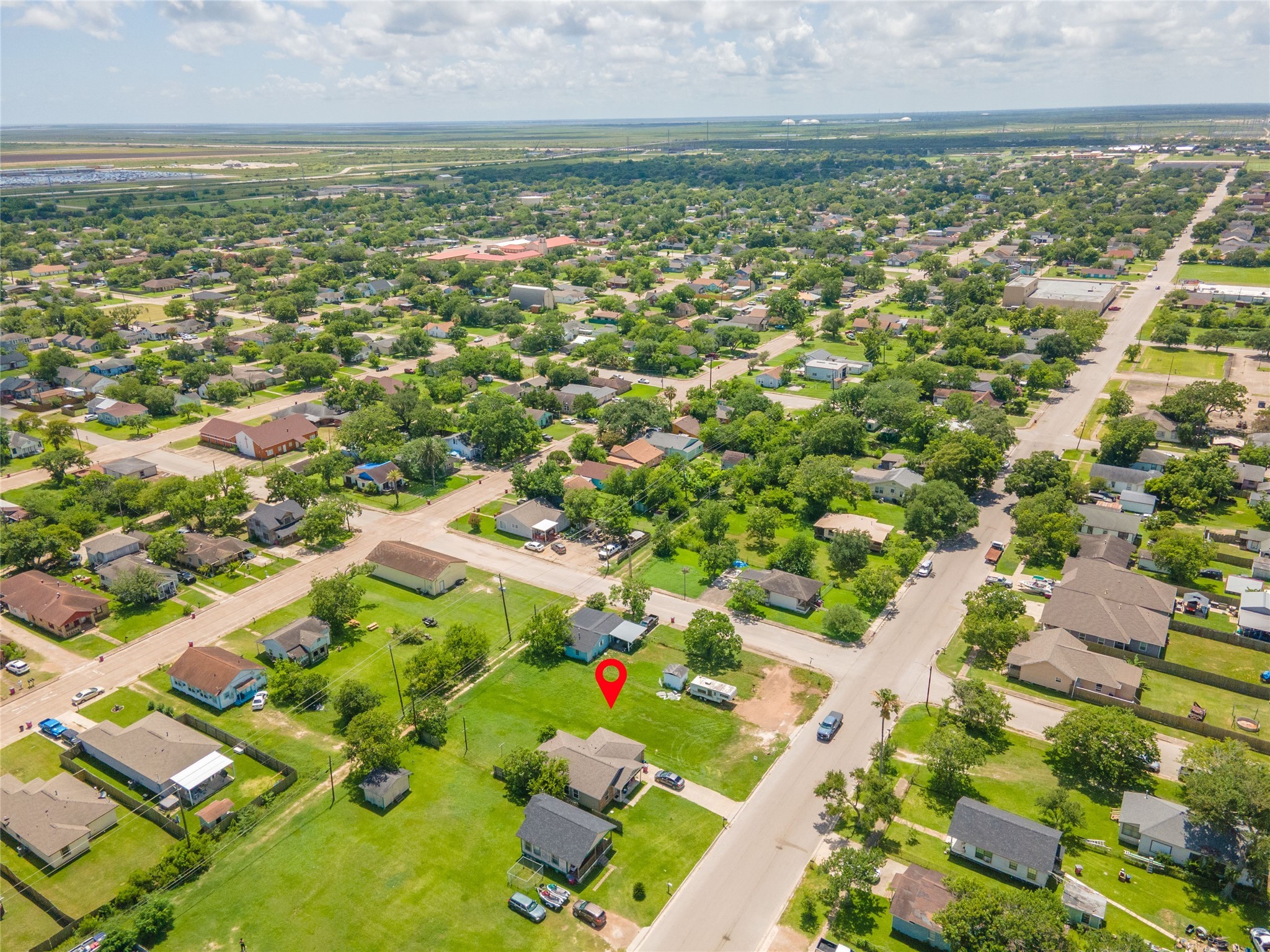 727 West Broad Street Freeport, TX 77541 - Photo 13 of 13 an aerial view of residential houses with outdoor space