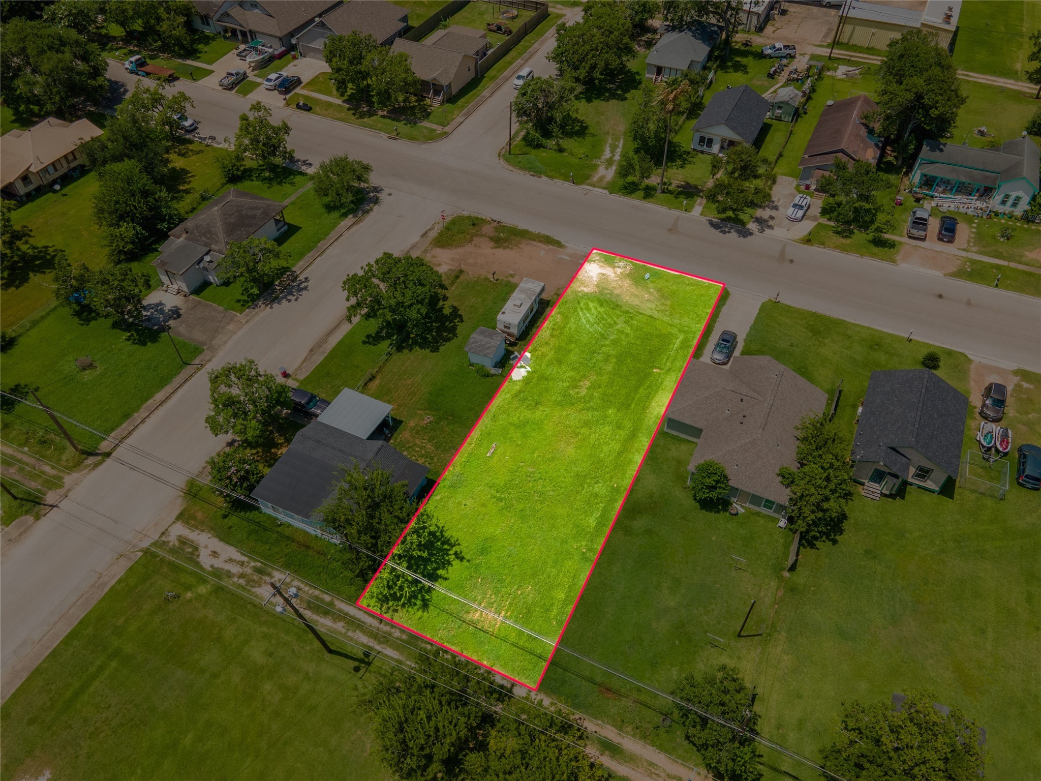 727 West Broad Street Freeport, TX 77541 - Photo 3 of 13 an aerial view of a residential houses with outdoor space