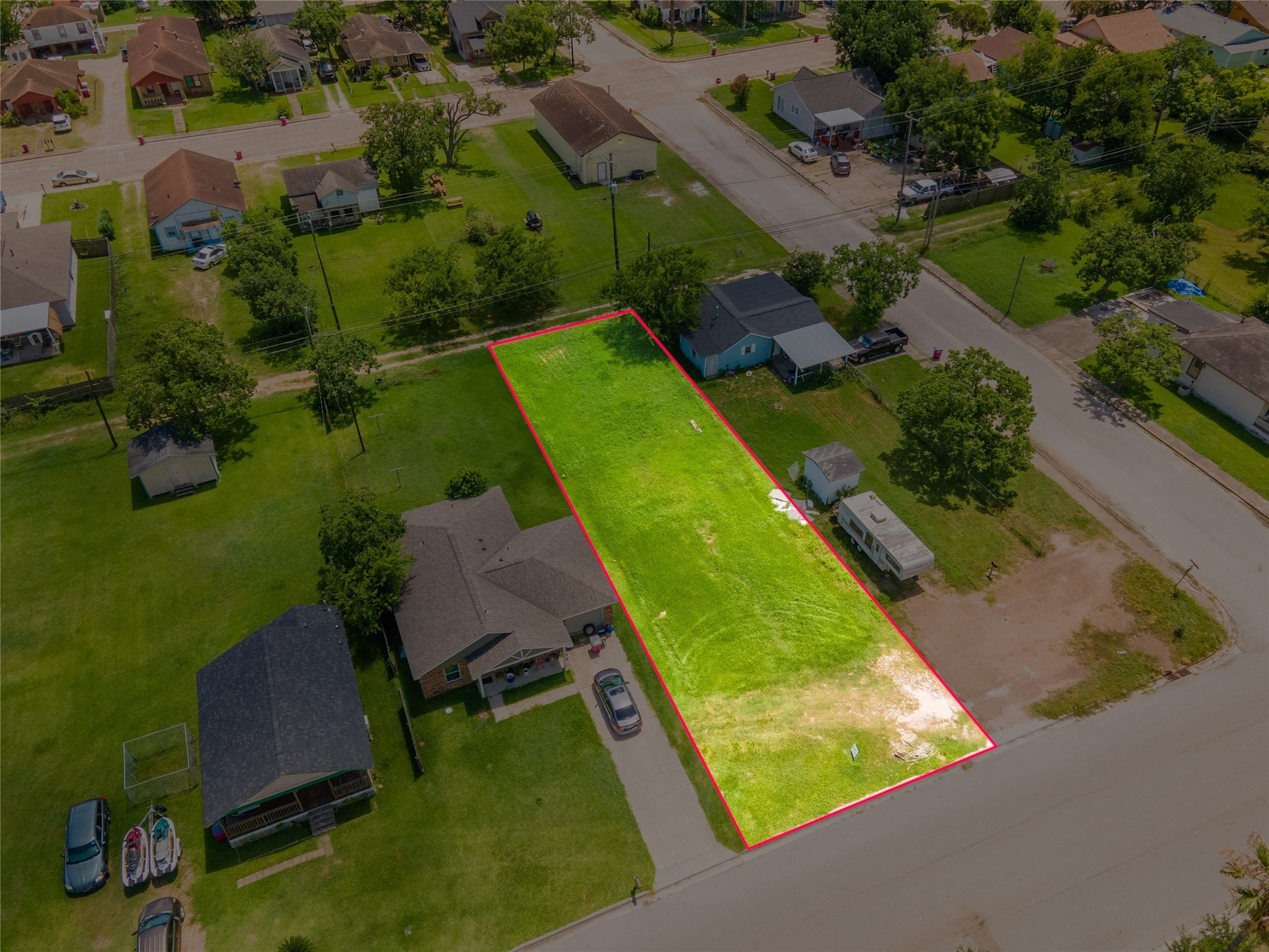 727 West Broad Street Freeport, TX 77541 - Photo 5 of 13 an aerial view of a pool