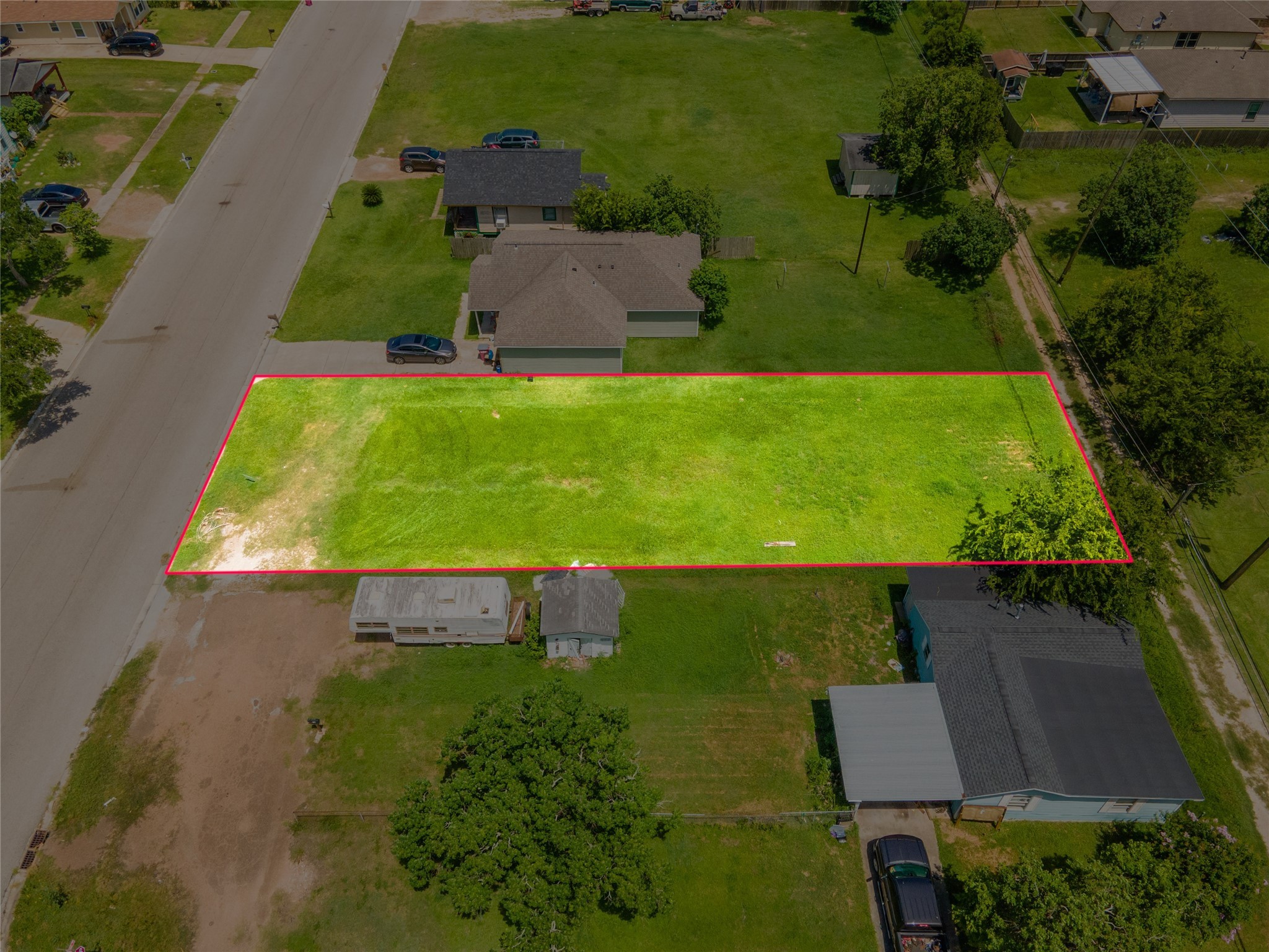 727 West Broad Street Freeport, TX 77541 - Photo 8 of 13 an aerial view of a house with a yard