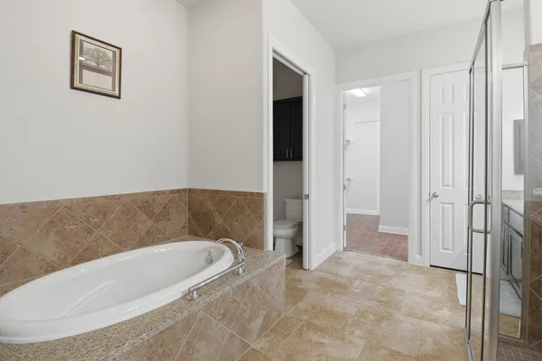 a bathroom with a sink a shower and a mirror