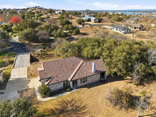 an aerial view of residential building and parking space
