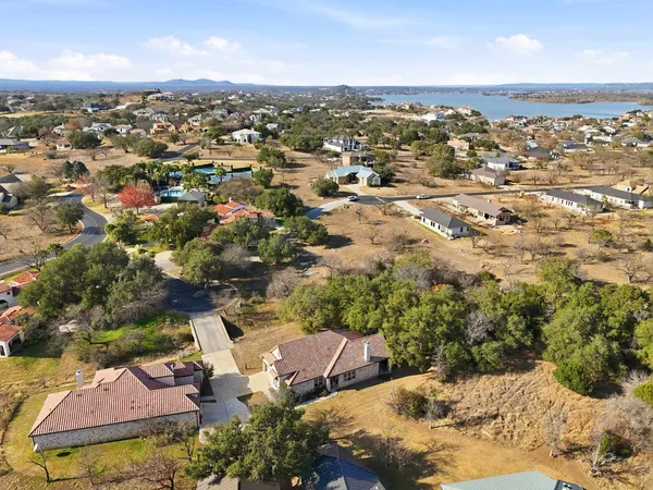 an aerial view of residential building with parking space