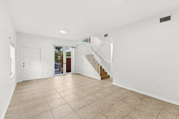a view of an entryway with stairs