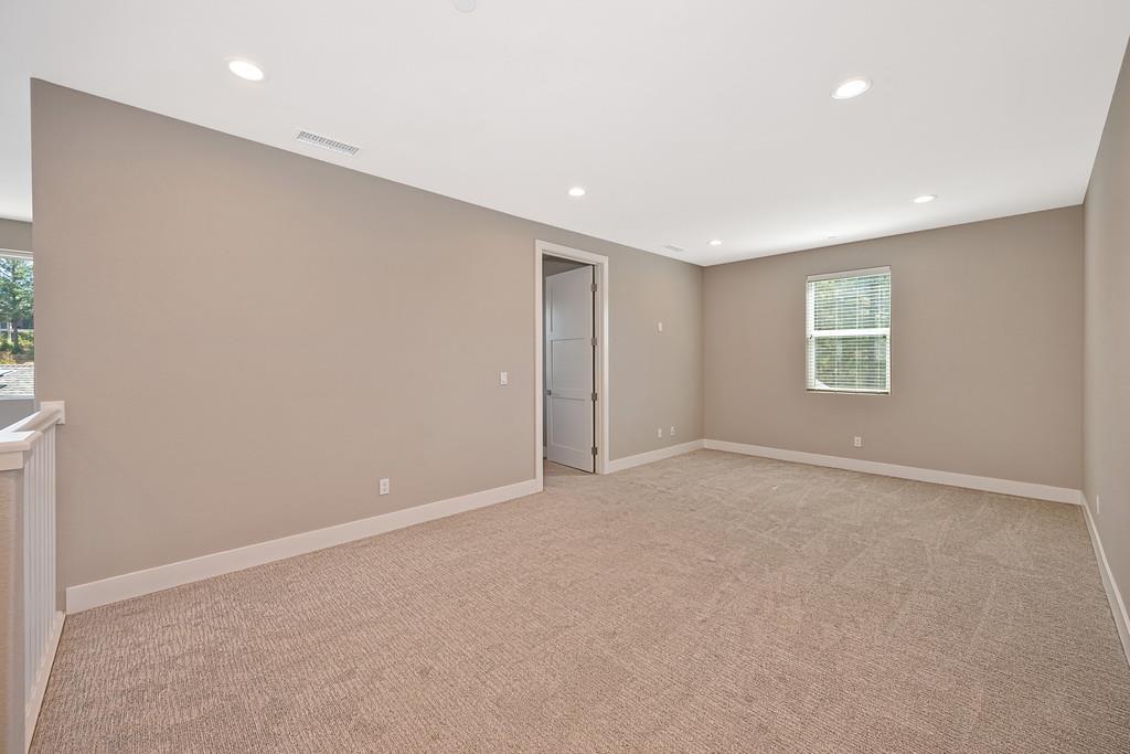504 Chase Court Colfax, CA 95713 - Photo 67 of 94 an empty room with windows