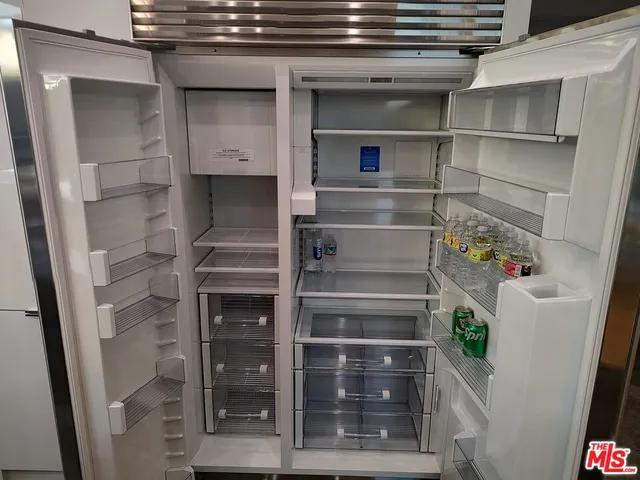 a bedroom with a bed and a table in it