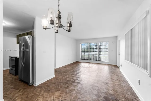 a view of a livingroom with a staircase