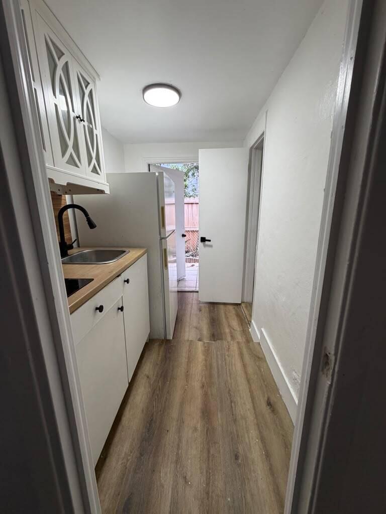 2137 Northwest 1st Terrace, Unit BACK Miami, FL 33125 - Photo 3 of 8 WhatsApp Image 2026-06-25 at 11.58.00 AM