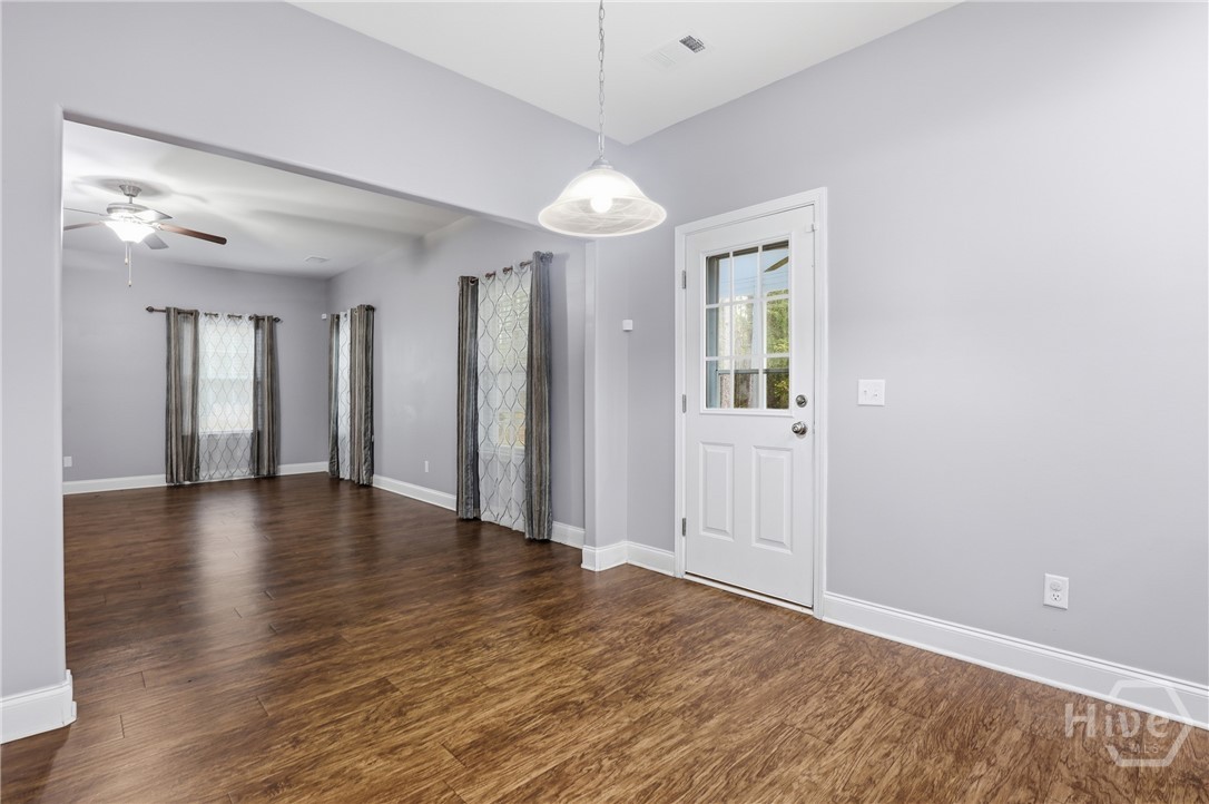 25 Frank Edwards Road Ellabell, GA 31308 - Photo 9 of 31 Great room and back door