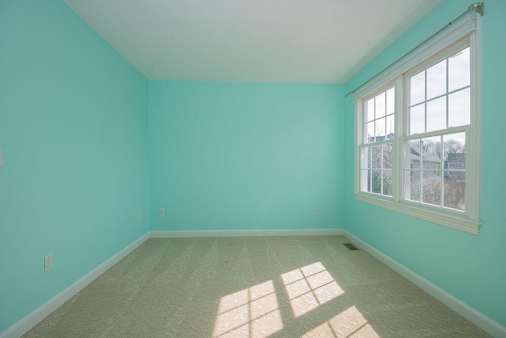 5 Boundary Stone Road Sutton, MA 01590 - Photo 24 of 42 an empty room with a window