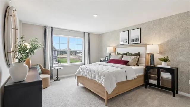 a bed room with a bed and a mirror