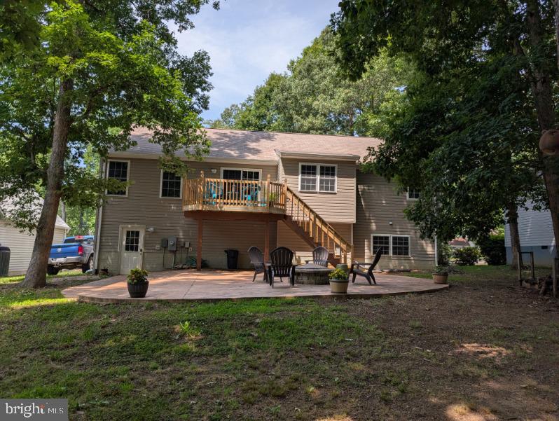 305 Birdie Road Locust Grove, VA 22508 - Photo 63 of 64 a view of a house with backyard porch and sitting area