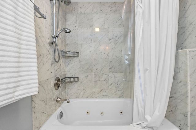 a bathroom with a bathtub