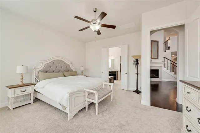 a view of staircase with wooden floor and a window