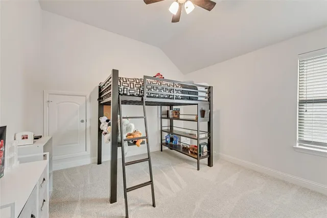 a bathroom with a sink double vanity and a mirror