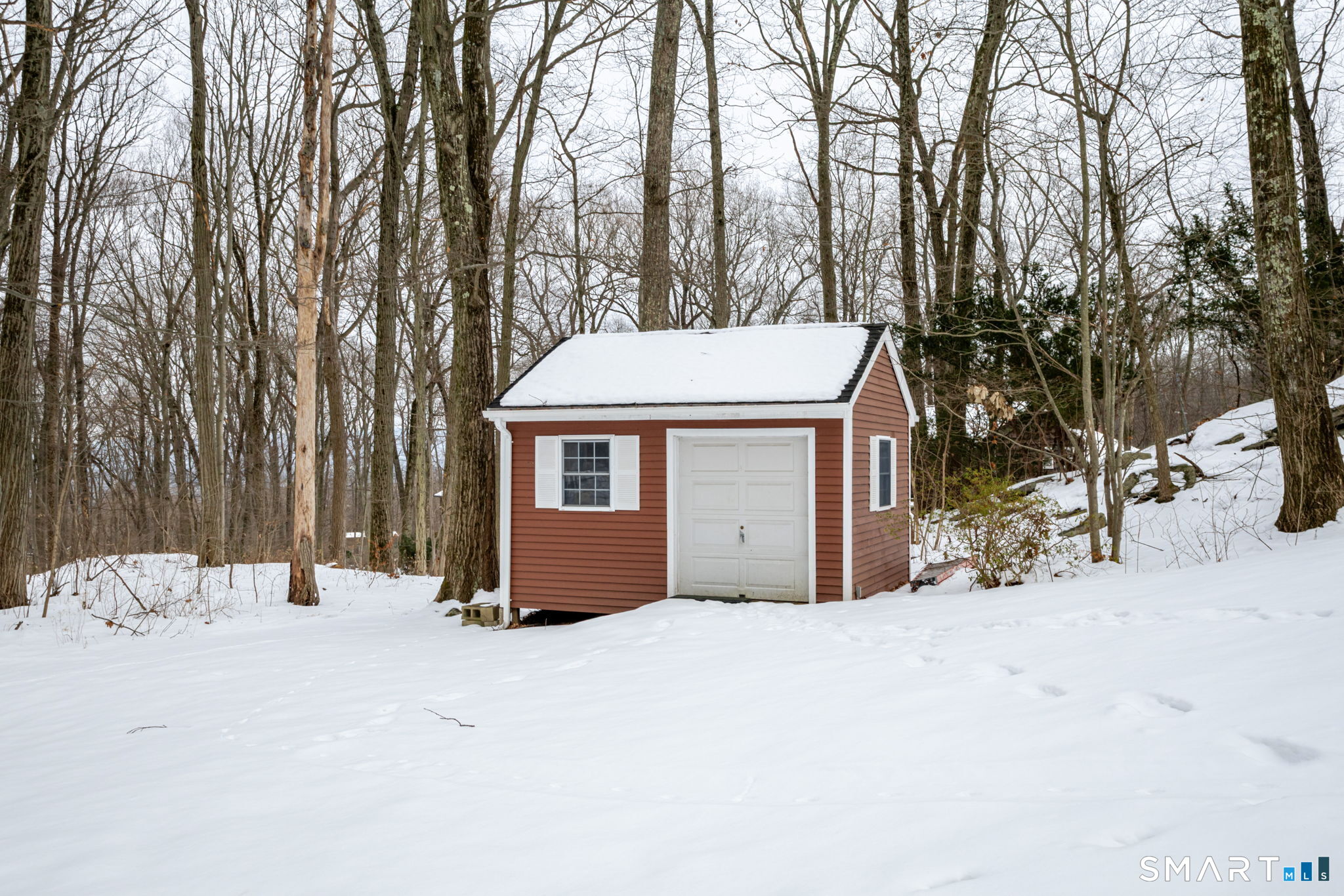 279 Old Mountain Road Southington, CT 06444 - Photo 17 of 37 a view of a house with a snow in the yard