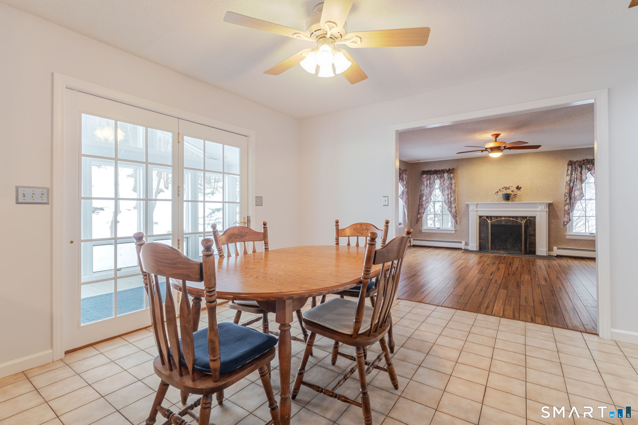 279 Old Mountain Road Southington, CT 06444 - Photo 22 of 37 a dining room with furniture a chandelier and wooden floor