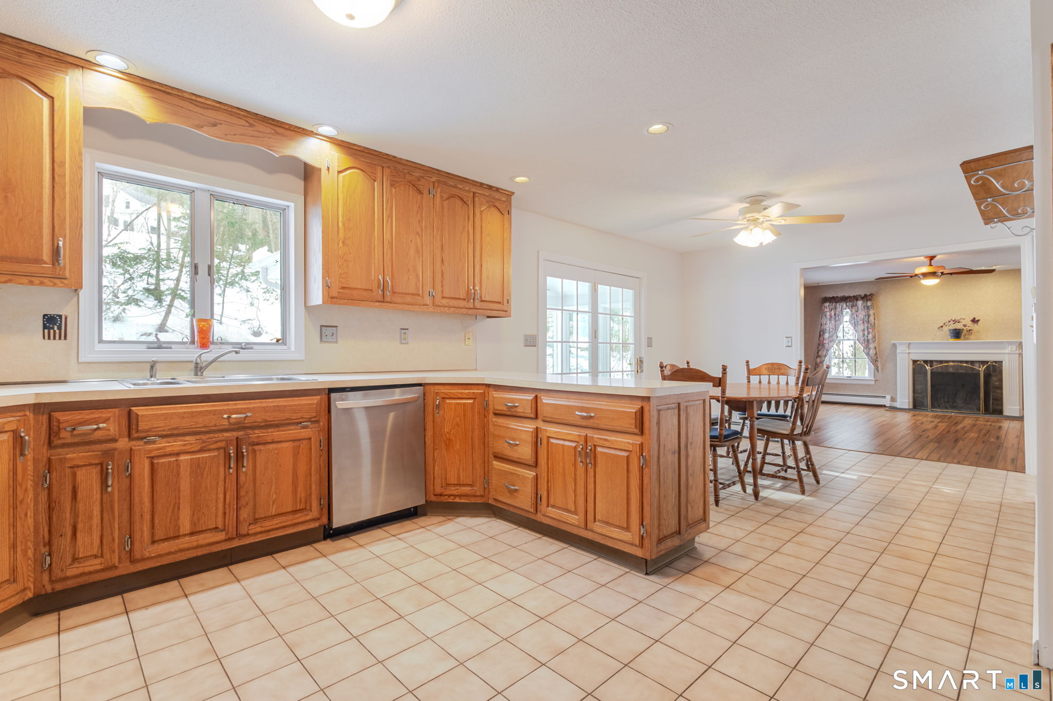 279 Old Mountain Road Southington, CT 06444 - Photo 24 of 37 a large kitchen with kitchen island granite countertop a sink cabinets and window