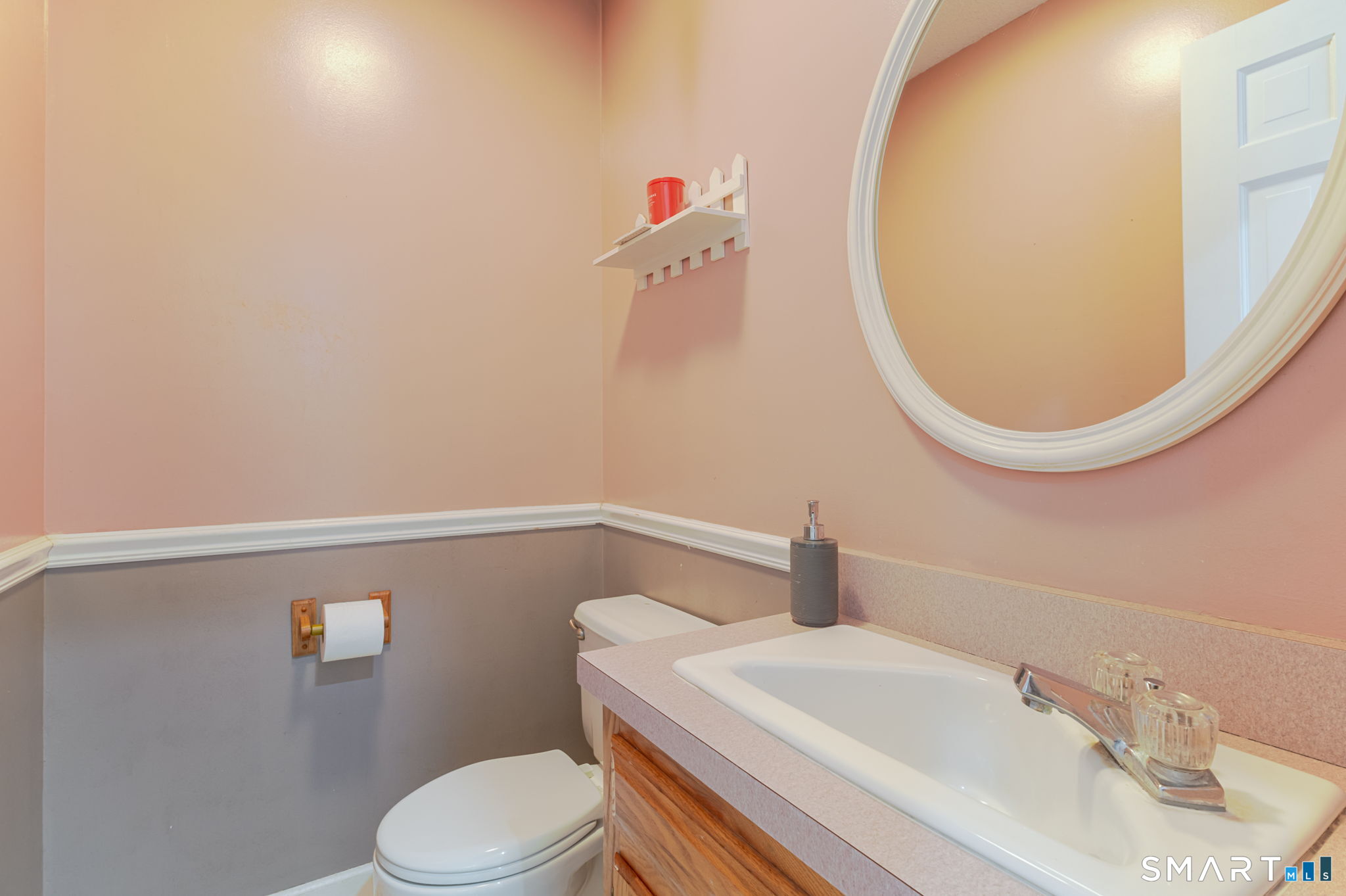 279 Old Mountain Road Southington, CT 06444 - Photo 28 of 37 a bathroom with a sink mirror vanity and toilet