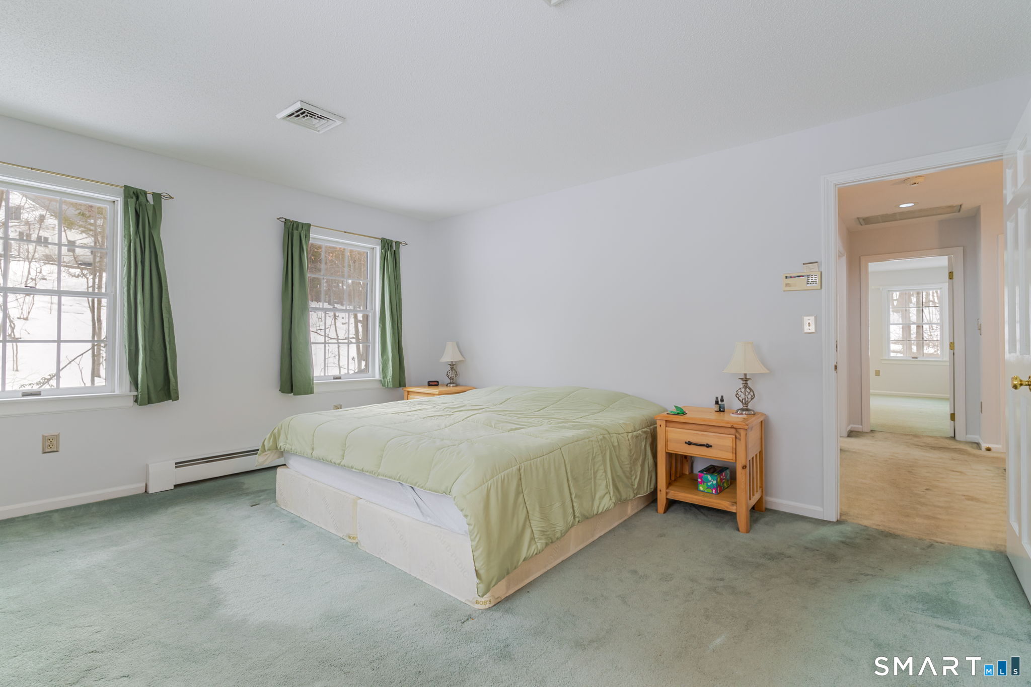 279 Old Mountain Road Southington, CT 06444 - Photo 34 of 37 a spacious bedroom with a bed and a window