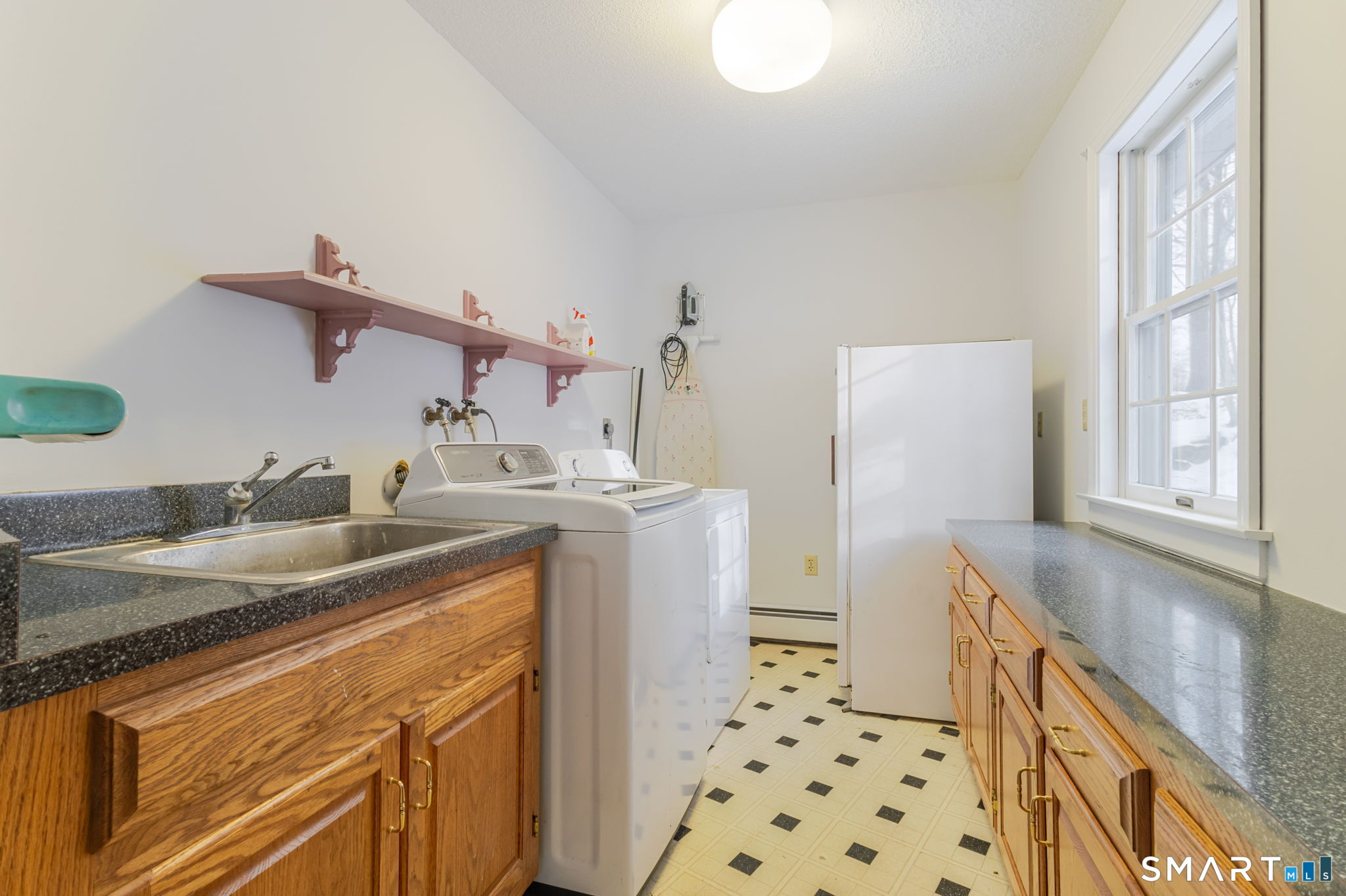 279 Old Mountain Road Southington, CT 06444 - Photo 7 of 37 a kitchen with a sink a stove a refrigerator and a window