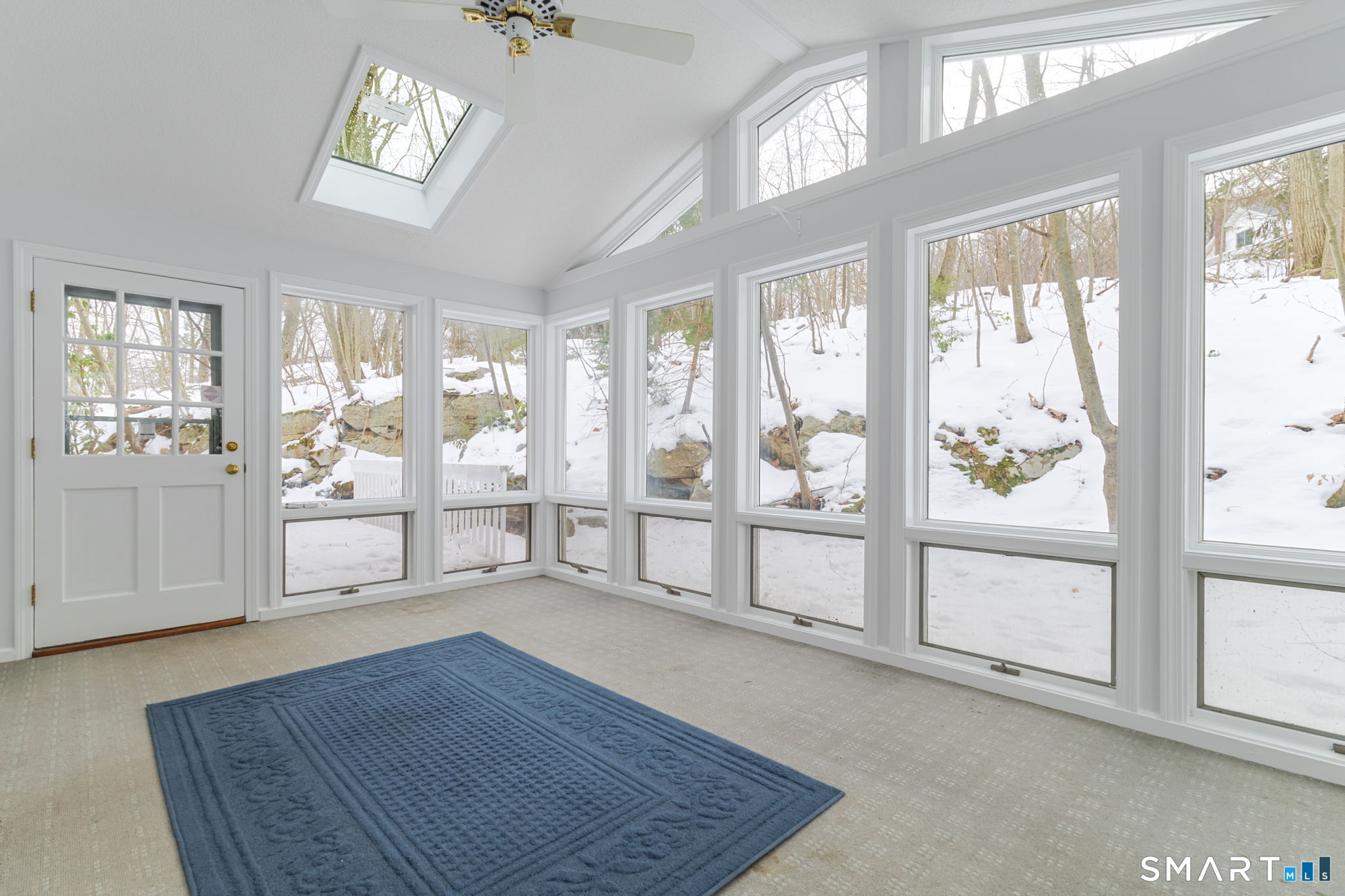 279 Old Mountain Road Southington, CT 06444 - Photo 8 of 37 a view of an empty room with wooden floor and a window