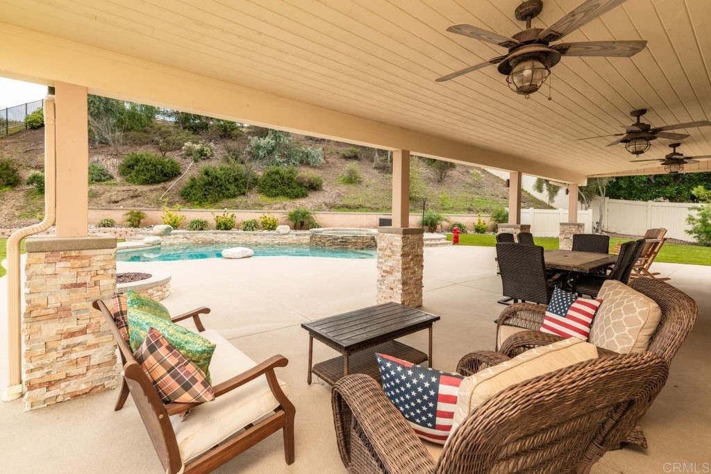 34063 Abbey Road Temecula, CA 92592 - Photo 11 of 33 a living room with furniture and a large window