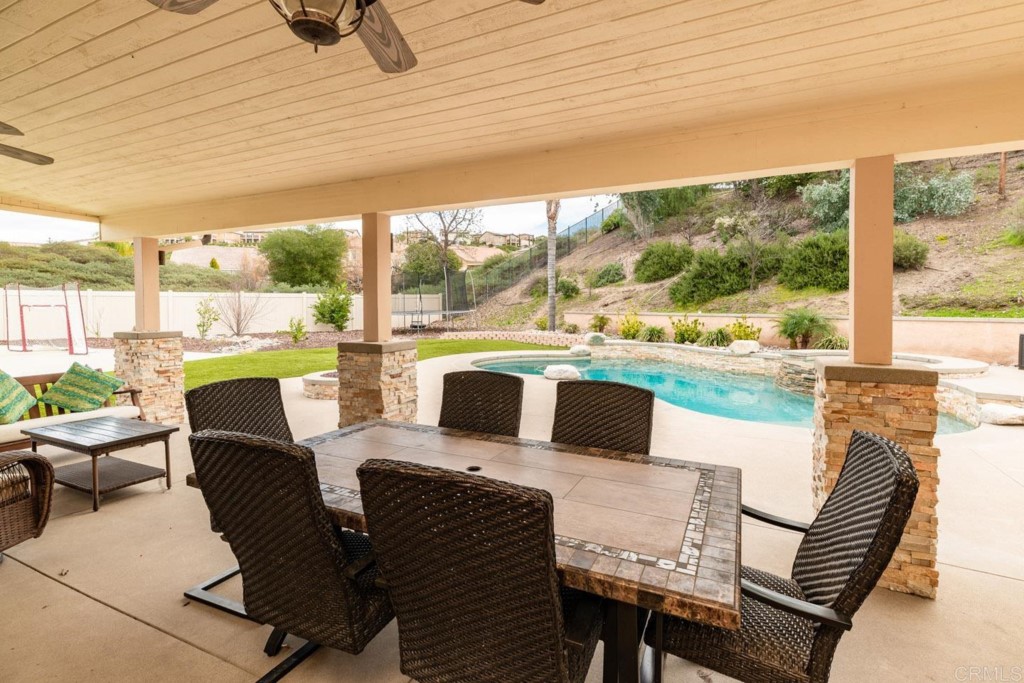34063 Abbey Road Temecula, CA 92592 - Photo 12 of 33 a view of an outdoor dining space with furniture
