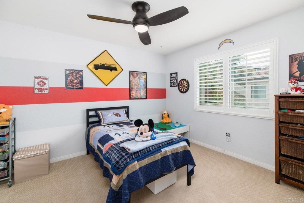 34063 Abbey Road Temecula, CA 92592 - Photo 23 of 33 a bedroom with a bed and a window