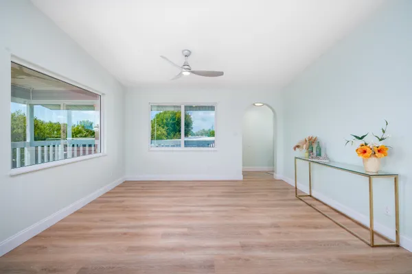 a view of a balcony with chairs