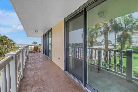 a spacious bathroom with a double vanity sink and a mirror