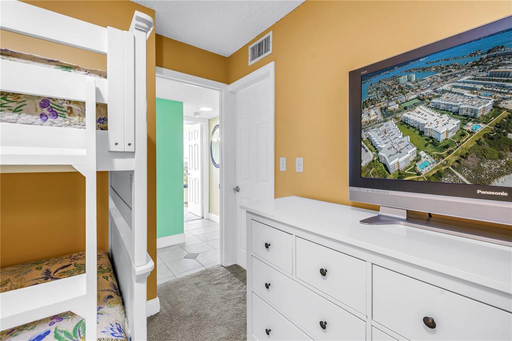 6600 Sunset Way, Unit 118 St. Pete Beach, FL 33706 - Photo 37 of 64 walk in closet with window